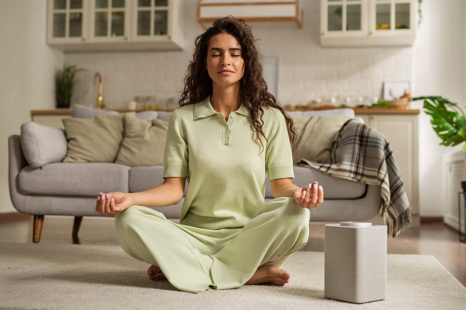 Woman meditating at home